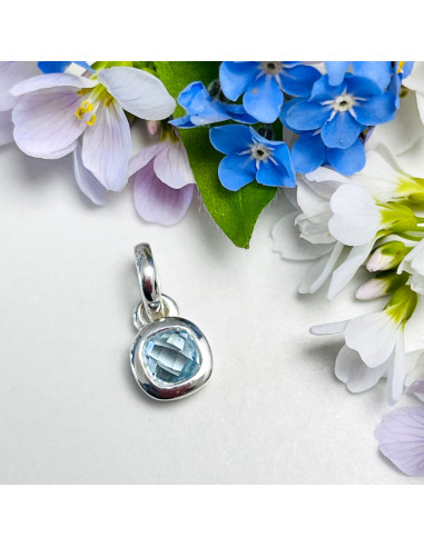 Spring - Srebrna zawieszka z niebieskim topazem