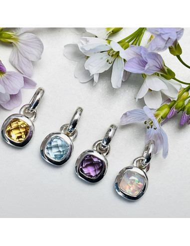 Spring - Srebrna zawieszka z niebieskim topazem